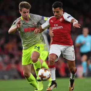 Clash of Stars: Sanchez vs. Klunter in Arsenal's Europa League Battle against 1. FC Koeln