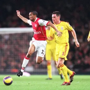 Clash of Titans: Arsenal's Clichy Shines as Gunners Triumph Over Finnan's Liverpool 3-0 in FA Premier League