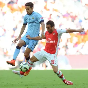Clash of Titans: Cazorla vs. Navas in the FA Community Shield Showdown Clash of Titans: Cazorla vs. Navas in the FA Community Shield Showdown