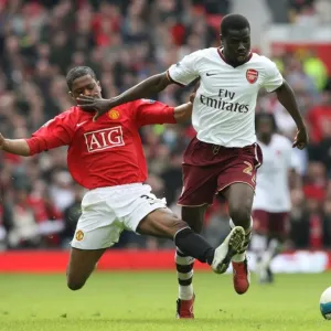 Clash of Titans: Eboue vs. Evra in Manchester United's 2:1 Victory over Arsenal, 2008 Clash of Titans: Eboue vs. Evra in Manchester United's 2:1 Victory over Arsenal, 2008