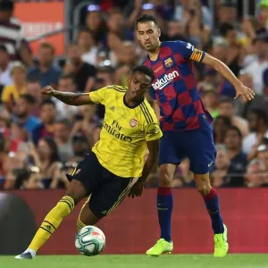 Clash of Titans: FC Barcelona vs. Arsenal - Joe Willock vs. Sergio Busquets