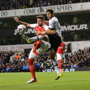 Clash of Titans: Giroud vs. Fazio - Arsenal vs. Tottenham Capital One Cup Showdown Clash of Titans: Giroud vs. Fazio - Arsenal vs. Tottenham Capital One Cup Showdown
