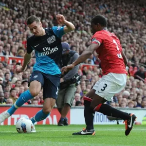 Clash of Titans: Jenkinson vs. Evra - Manchester United vs. Arsenal, Premier League 2011-12 Clash of Titans: Jenkinson vs. Evra - Manchester United vs. Arsenal, Premier League 2011-12