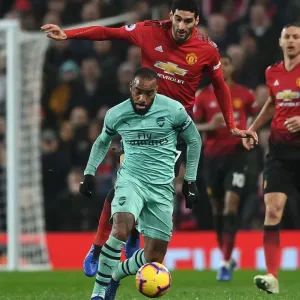 Clash of Titans: Lacazette vs. Fellaini - Manchester United vs. Arsenal FC, Premier League Clash of Titans: Lacazette vs. Fellaini - Manchester United vs. Arsenal FC, Premier League