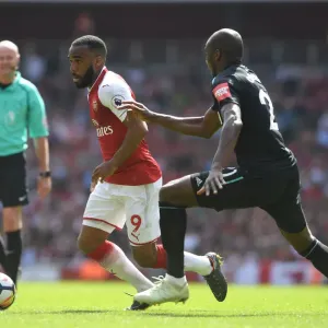 Clash of Titans: Lacazette vs. Ogbonna in Arsenal's Battle Against West Ham Clash of Titans: Lacazette vs. Ogbonna in Arsenal's Battle Against West Ham
