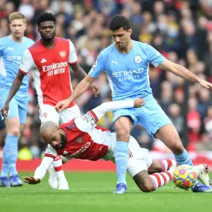 Clash of Titans: Lacazette vs Rodri - Arsenal vs Manchester City Showdown (2021-22)