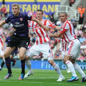 Clash of Titans: Per Mertesacker vs. Robert Huth & Jonathan Walters (Stoke City vs. Arsenal, 2012-13) Clash of Titans: Per Mertesacker vs. Robert Huth & Jonathan Walters (Stoke City vs. Arsenal, 2012-13)