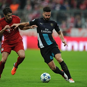 Clash of Titans: Olivier Giroud vs. Javi Martinez - A Battle of Strength and Skill in the UEFA Champions League