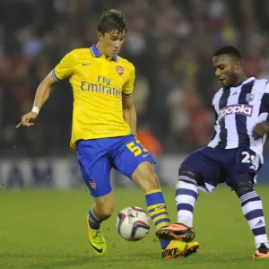 Clash of the Titans: Olsson vs Sessegnon in the Capital One Cup Showdown (West Bromwich Albion vs Arsenal, 2013-14) Clash of the Titans: Olsson vs Sessegnon in the Capital One Cup Showdown (West Bromwich Albion vs Arsenal, 2013-14)