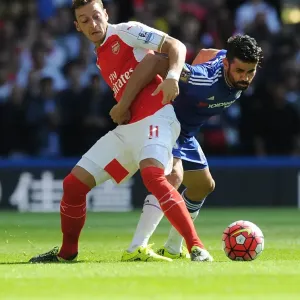 Clash of Titans: Ozil vs Costa - Premier League Showdown: A Battle Between Arsenal's Ozil and Chelsea's Costa Clash of Titans: Ozil vs Costa - Premier League Showdown: A Battle Between Arsenal's Ozil and Chelsea's Costa