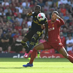 Clash of Titans: Pepe vs. Van Dijk - Premier League Showdown: Arsenal's Pepe Takes on Liverpool's Van Dijk