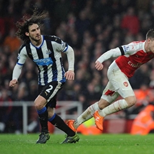Clash of the Titans: Ramsey vs. Coloccini in Intense Arsenal-Newcastle Showdown