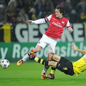 Clash of Titans: Rosicky vs. Subotic - Arsenal vs. Borussia Dortmund, UEFA Champions League, 2013: A Battle of Strength and Skill