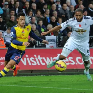 Clash of Titans: Sanchez vs. Williams - Arsenal's Star Forward Goes Head-to-Head with Swansea's Defiant Captain