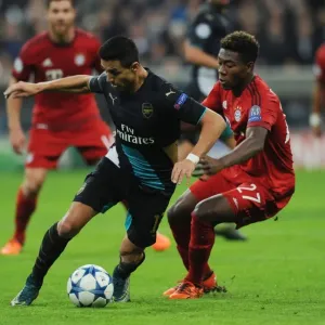 Clash of Titans: Sanchez vs. Coman - Bayern Munich vs. Arsenal, UEFA Champions League Clash of Titans: Sanchez vs. Coman - Bayern Munich vs. Arsenal, UEFA Champions League