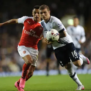 Clash of Titans: Sanchez vs. Trippier - The Battle of the Capital One Cup: Arsenal vs. Tottenham Clash of Titans: Sanchez vs. Trippier - The Battle of the Capital One Cup: Arsenal vs. Tottenham