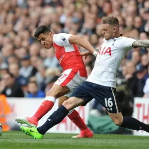 Clash of Titans: Sanchez vs. Trippier in the Battle of North London (Tottenham Hotspur v Arsenal, Premier League) Clash of Titans: Sanchez vs. Trippier in the Battle of North London (Tottenham Hotspur v Arsenal, Premier League)