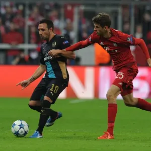 Clash of Titans: Santi Cazorla vs Thomas Muller - Battle at the Allianz Arena Clash of Titans: Santi Cazorla vs Thomas Muller - Battle at the Allianz Arena