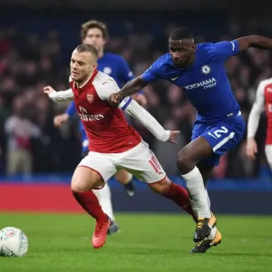 Clash of Titans: Wilshere vs. Rudiger in Carabao Cup Semi-Final Showdown (Chelsea vs. Arsenal) Clash of Titans: Wilshere vs. Rudiger in Carabao Cup Semi-Final Showdown (Chelsea vs. Arsenal)