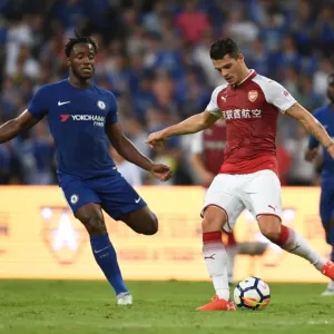 Clash of Titans: Xhaka vs Batshuayi in Arsenal's Pre-Season Battle with Chelsea