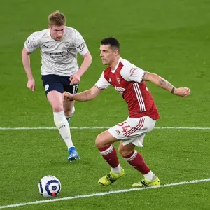 Clash of Titans: Xhaka vs. de Bruyne - Arsenal vs. Manchester City, Premier League 2021 Clash of Titans: Xhaka vs. de Bruyne - Arsenal vs. Manchester City, Premier League 2021