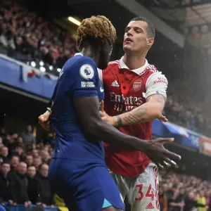 Print of Granit Xhaka vs Trevoh Chalobah Print of Granit Xhaka vs Trevoh Chalobah
