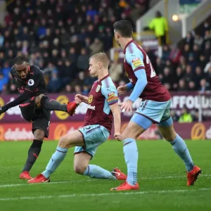 Clash at Turf Moor: Lacazette vs Mee in Intense Battle at Burnley-Arsenal Premier League Match Clash at Turf Moor: Lacazette vs Mee in Intense Battle at Burnley-Arsenal Premier League Match