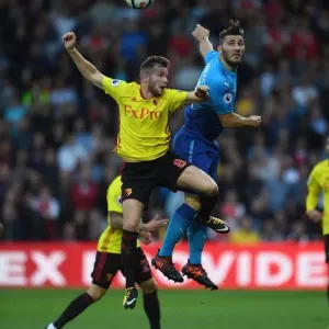Clash at Vicarage Road: Kolasinac vs. Cleverley in the Premier League Showdown