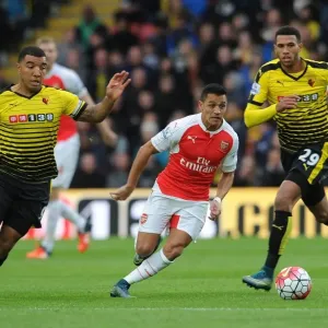 Clash at Vicarage Road: Sanchez vs Capoue and Deeney - Arsenal's Star Forward Tangles with Watford Duo