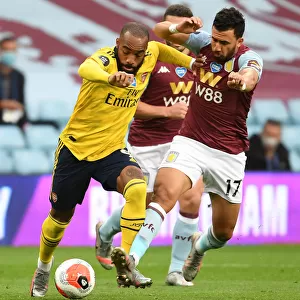 Clash at Villa Park: Lacazette vs. Trezeguet in Premier League Showdown (Aston Villa vs. Arsenal, 2019-20)