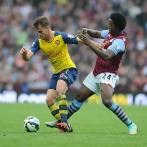 Clash at Villa Park: Ramsey vs. Sanchez, Premier League Showdown (2014)