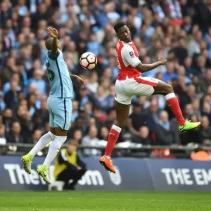 Clash at Wembley: Welbeck Leaps Over Fernandinho in FA Cup Semi-Final Showdown (Arsenal vs Manchester City)