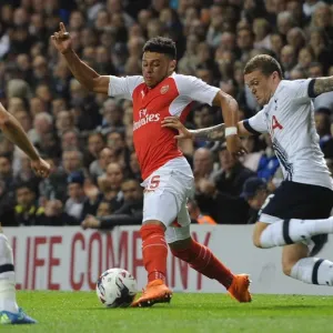 Clash of Wings: Oxlade-Chamberlain vs. Trippier in the Intense Battle of the Capital One Cup Clash of Wings: Oxlade-Chamberlain vs. Trippier in the Intense Battle of the Capital One Cup