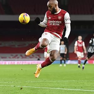 Behind Closed Doors: Alex Lacazette in Action for Arsenal vs. Newcastle United, Premier League 2021