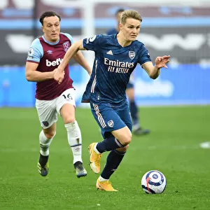 Behind Closed Doors: Martin Odegaard Outsmarts Noble in Arsenal's Triumph over West Ham, Premier League 2021