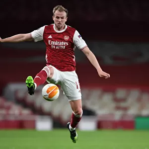 Behind Closed Doors: Rob Holding Faces Slavia Praha in Europa League Quarterfinal for Arsenal