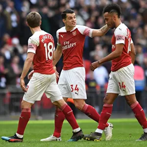 Consoling Aubameyang: A Moment of Empathy Between Xhaka and Arsenal Teammate Amidst Rivalry