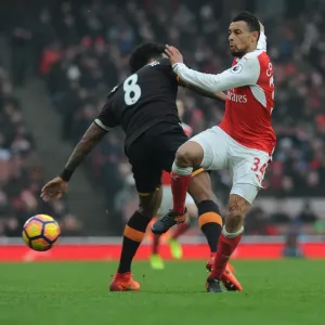 Coquelin vs Huddlestone: A Premier League Battle at Emirates Stadium