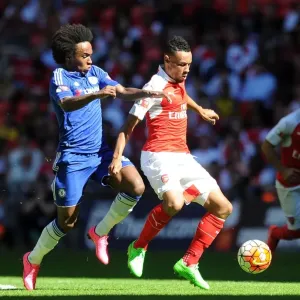 Coquelin vs. Willian: A Footballing Battle in the FA Community Shield Clash Between Arsenal and Chelsea Coquelin vs. Willian: A Footballing Battle in the FA Community Shield Clash Between Arsenal and Chelsea