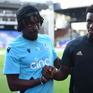 Crystal Palace vs. Arsenal: Nketiah and Eze Share a Moment in the 2022-23 Premier League Clash