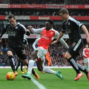 Danny Welbeck (Arsenal) Christian Fuchs and Robert Huth (Leicester) Danny Welbeck (Arsenal) Christian Fuchs and Robert Huth (Leicester)