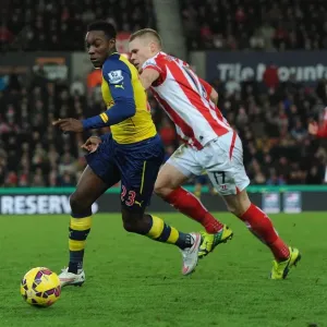 Danny Welbeck Dashes Past Ryan Shawcross: A Pivotal Moment from Stoke City vs. Arsenal (2014-15) Danny Welbeck Dashes Past Ryan Shawcross: A Pivotal Moment from Stoke City vs. Arsenal (2014-15)
