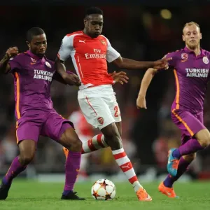 Danny Welbeck Stands Firm Against Galatasaray's Aurelien Chedjou and Semih Kaya in Intense Arsenal-Galatasaray Champions League Showdown Danny Welbeck Stands Firm Against Galatasaray's Aurelien Chedjou and Semih Kaya in Intense Arsenal-Galatasaray Champions League Showdown