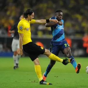 Danny Welbeck vs. Neven Subotic: Intense Battle in Borussia Dortmund vs. Arsenal UEFA Champions League Clash
