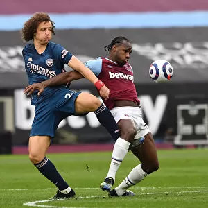 David Luiz vs Michail Antonio: A Battle of Strength in the Intense West Ham United vs Arsenal Premier League Clash