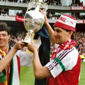 David O Leary and Tony Adams with the League Championship Trophy