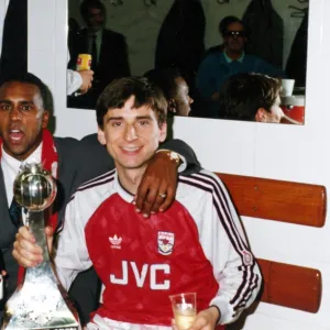 David Rocastle and Alan Smith celebrate winning the League Championship