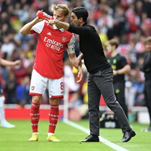 Deep in Thought: The Intense Discussion Between Arteta and Odegaard Amidst Arsenal vs. Tottenham Rivalry (2022-23)
