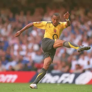 Defiant Gilberto Stands: Arsenal vs. Chelsea in the FA Community Shield Battle at Millennium Stadium, 2005