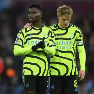 Dejected Arsenal Duo: Aston Villa Outshines Gunners in 2023-24 Premier League Clash Dejected Arsenal Duo: Aston Villa Outshines Gunners in 2023-24 Premier League Clash